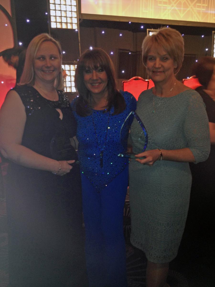 Adrienne and Christine, pictured with awards host Jane McDonald