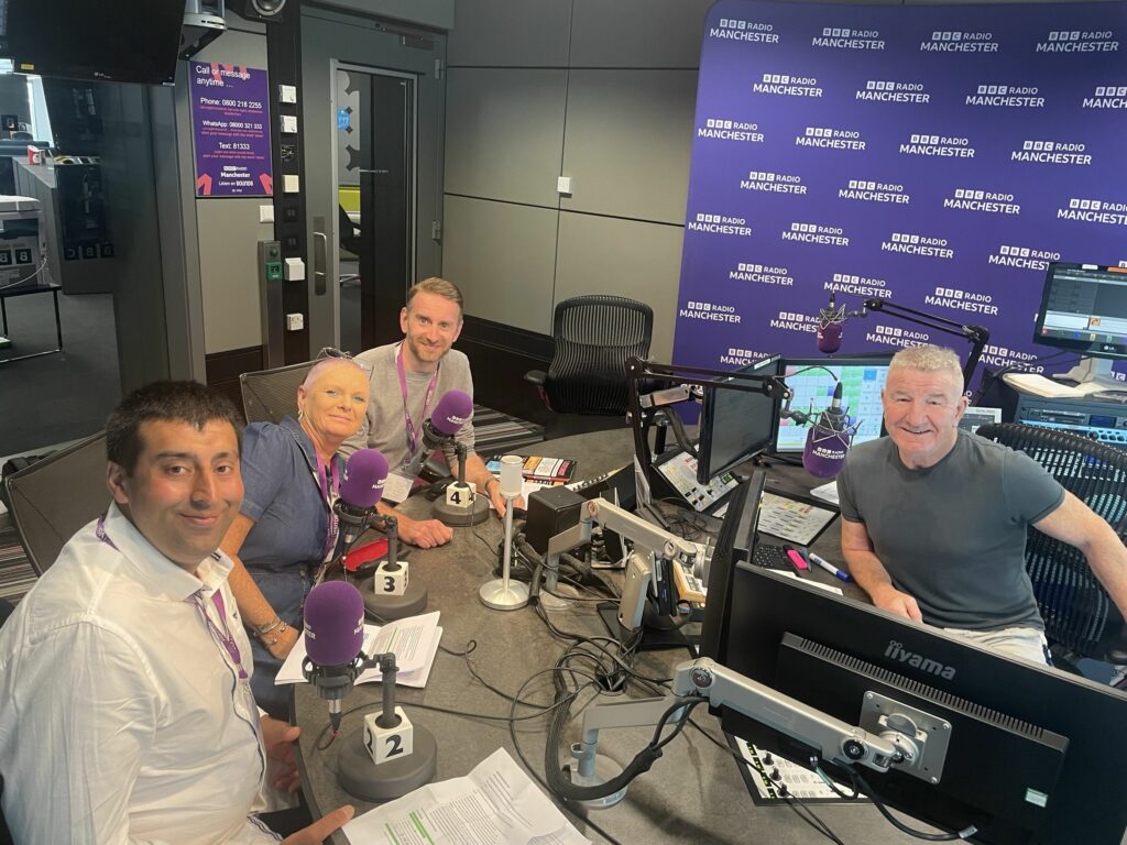 Tauseef, Sharon and Jim at BBC Radio Manchester being interviewed by Mike Sweeney.