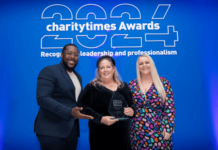 Managing Director for TEC, Jo Scammell, and Virtual Care Centre Manager, Natalie Evans collect our award for Digital Transformation of the Year at the Charity Times Awards 2024.