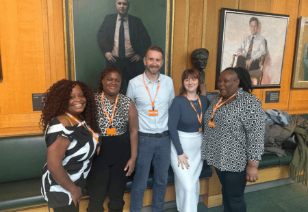 Colleagues and a person we support attends the APPG Parliamentary Coffee Morning